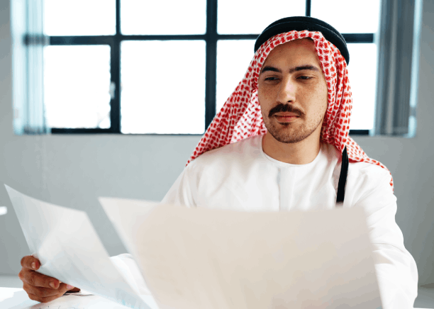 An experienced linguist edits a bilingual file as Arabic Translation Services in Iowa ensure culturally accurate wording.