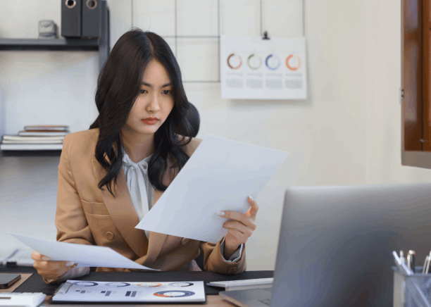 A translator working on Birth Certificate translations in Iowa, ensuring compliance with government agencies with standards.