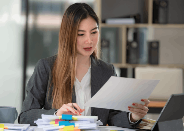 A translator working on certifying a Birth Certificate translation in Iowa for official submission, meeting all requirements.