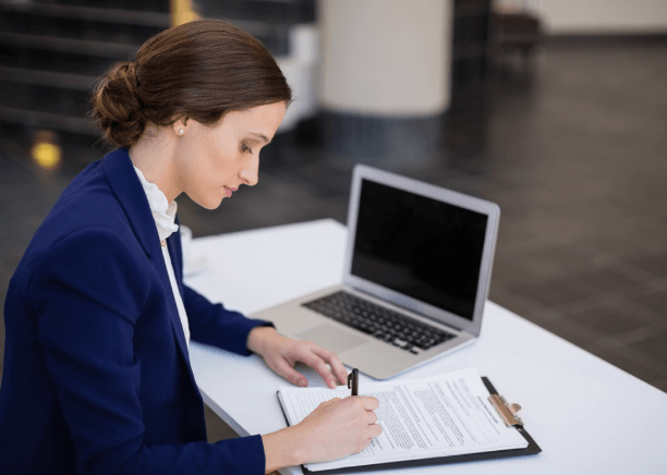 Legal professional using expert legal translation services in Des Moines to assist with contracts and immigration documents. Legal professional using expert legal translation services in Des Moines to assist with contracts and immigration documents.