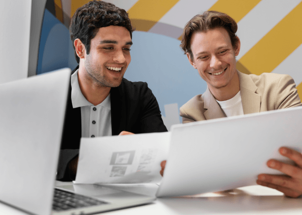 Corporate managers review a translated website draft with a linguist, using Spanish Translation Services in Iowa.