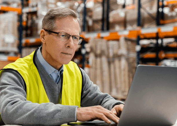 A technical editor in Translation Services in Ankeny reviews a user manual, checking labels, warnings, and diagrams.